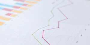 a stacked bar and line graph